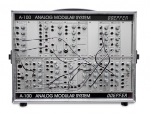 A modular synth. The oscillators, filters, envelopes, amplifiers and other gadgets are manually connected with patch chords. Each sound can have it's own synth architecture.